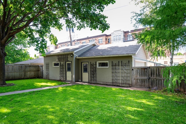 1043 Lincoln Ave, Saint Paul, MN 55105 - rear view of property with a shingled roof