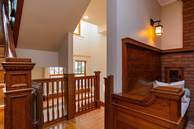 1043 Lincoln Ave, Saint Paul, MN 55105 - corridor featuring wood finished floors, an upstairs landing, and recessed lighting