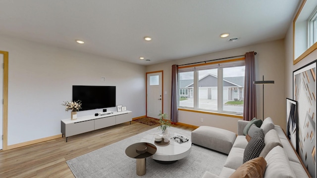 400 Alfred Ct SW, Eyota, MN 55934 - living area with wood finished floors, baseboards, and recessed lighting