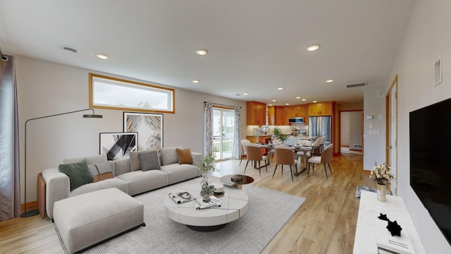 400 Alfred Ct SW, Eyota, MN 55934 - living area with light wood-style flooring and recessed lighting