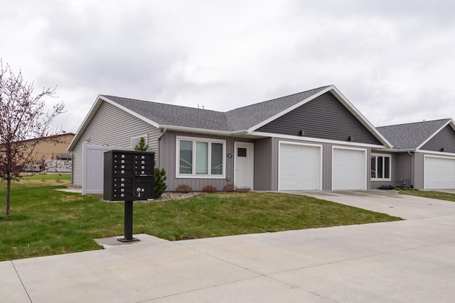 400 Alfred Ct SW, Eyota, MN 55934 - single story home with an attached garage, board and batten siding, a front yard, and concrete driveway