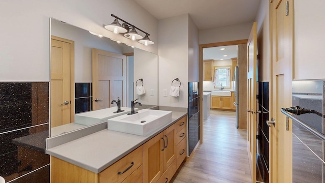 400 Alfred Ct SW, Eyota, MN 55934 - bathroom with wood finished floors and vanity