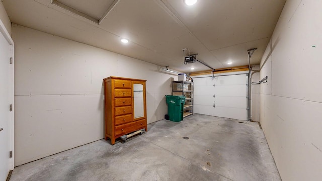 400 Alfred Ct SW, Eyota, MN 55934 - garage featuring a garage door opener