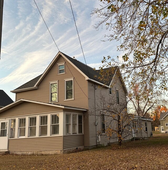 15 1st St SE, Melrose, MN 56352 - back of property featuring a sunroom