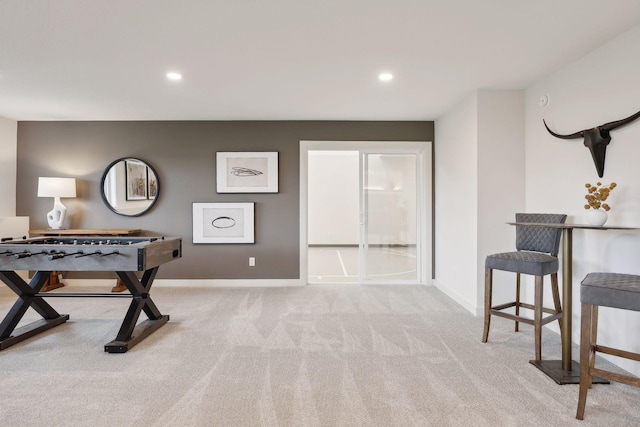 rec room with carpet floors, baseboards, and recessed lighting