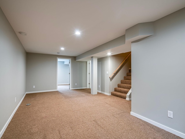 finished basement with recessed lighting, carpet, baseboards, and stairway