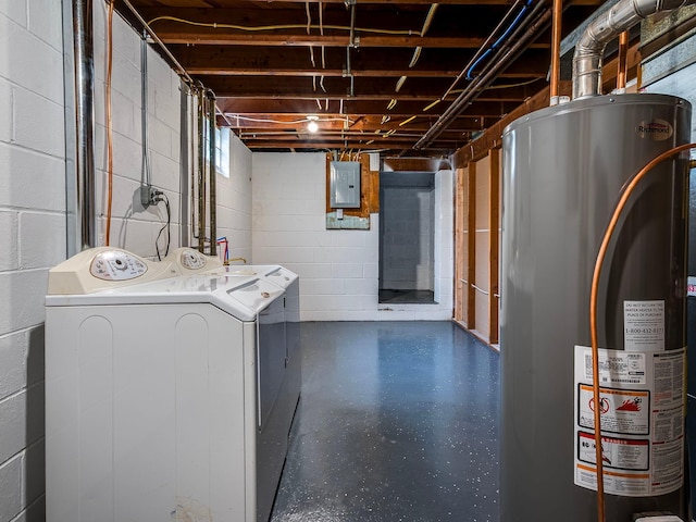 clothes washing area with laundry area, washer and dryer, gas water heater, electric panel, and concrete block wall
