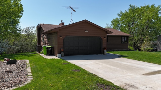 46236 186th Avenue Ct, Zumbrota, MN 55992 - view of front of property with a garage, a chimney, a front yard, and concrete driveway