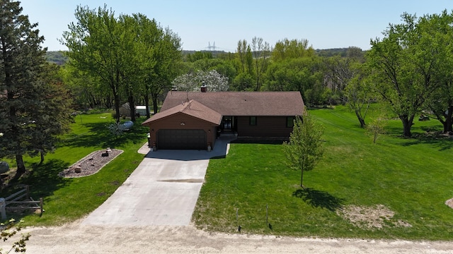 46236 186th Avenue Ct, Zumbrota, MN 55992 - view of front facade featuring an attached garage, concrete driveway, and a front yard