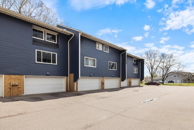 exterior space featuring an attached garage