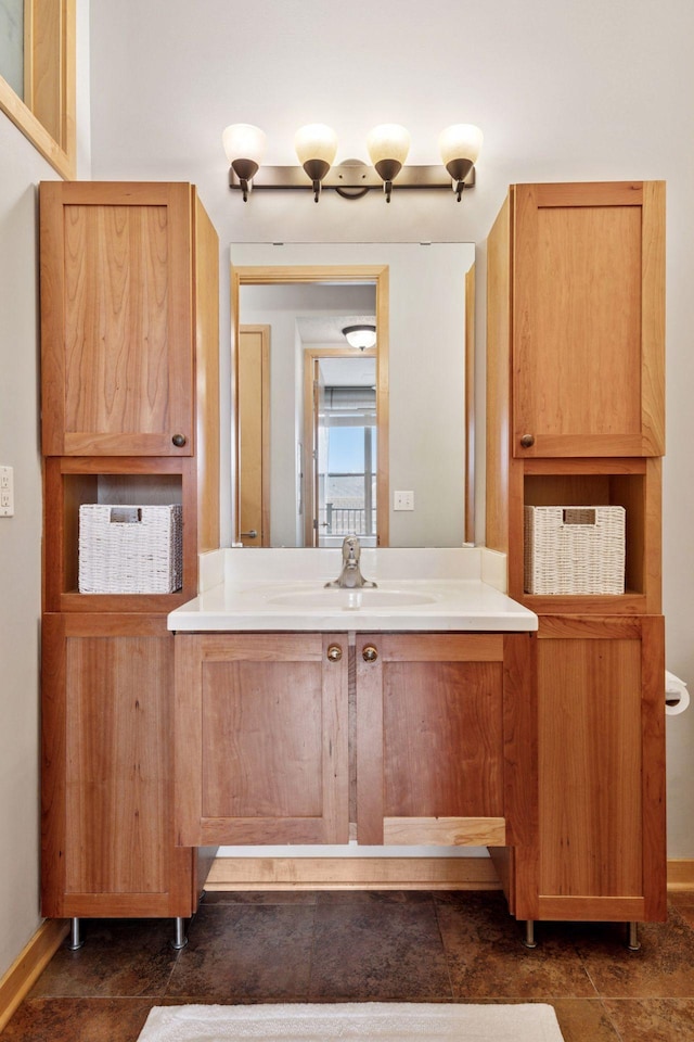 3640 Wooddale Ave S Unit 317, Saint Louis Park, MN 55416 - bathroom with baseboards and vanity