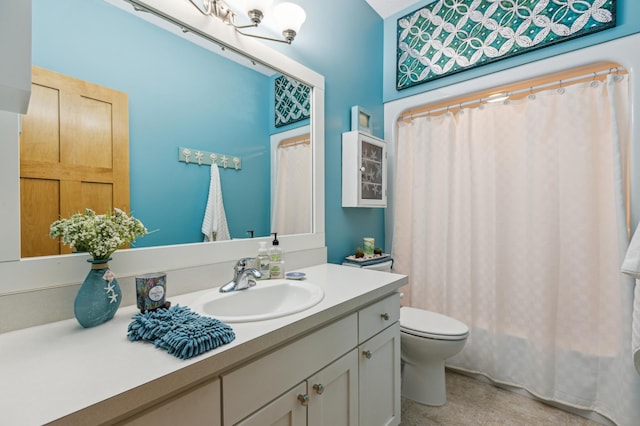 full bath featuring toilet and vanity