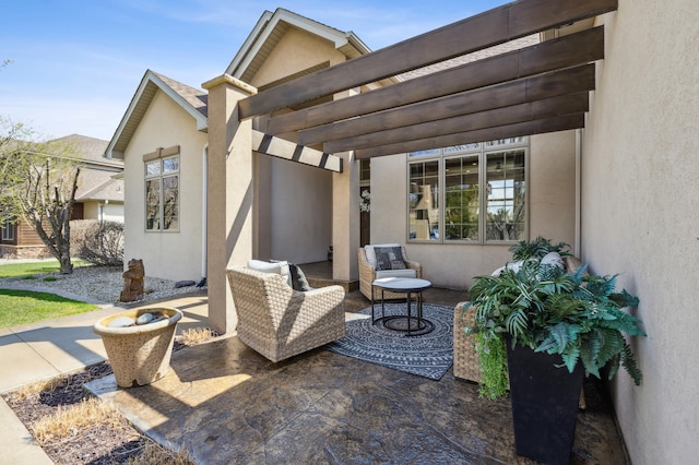 view of patio featuring a pergola