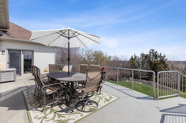 view of patio featuring outdoor dining area