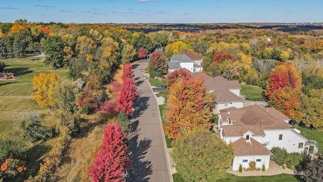 bird's eye view featuring a forest view