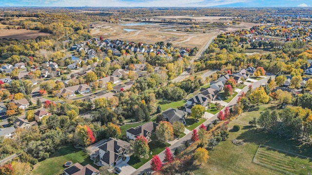 birds eye view of property with a residential view