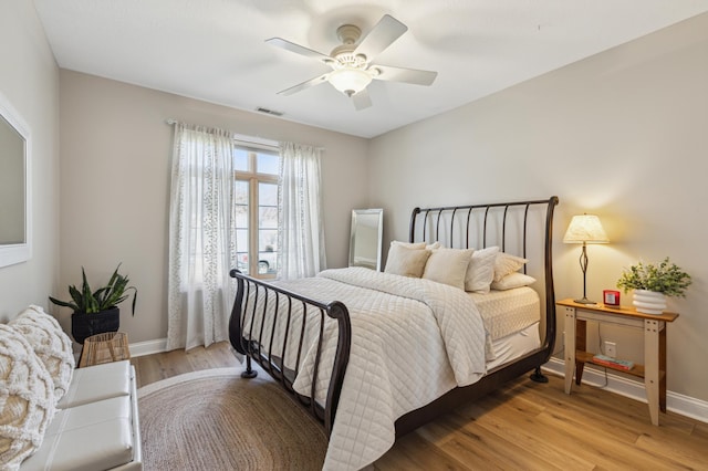 2250 Lancaster Ave NE, Saint Michael, MN 55376 - bedroom featuring light wood finished floors and a ceiling fan