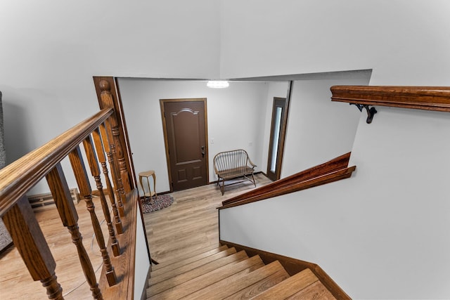 216 Richard Ave SE, Isanti, MN 55040 - staircase featuring wood finished floors
