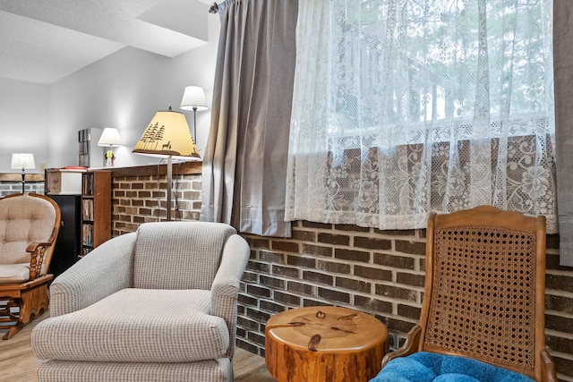 216 Richard Ave SE, Isanti, MN 55040 - sitting room with wood finished floors