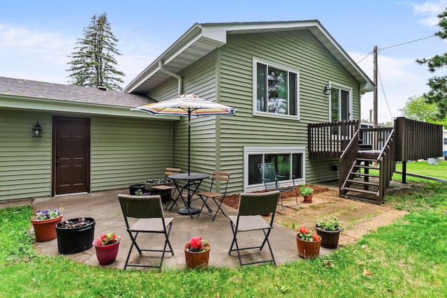 216 Richard Ave SE, Isanti, MN 55040 - rear view of property with a wooden deck, a patio area, and stairway