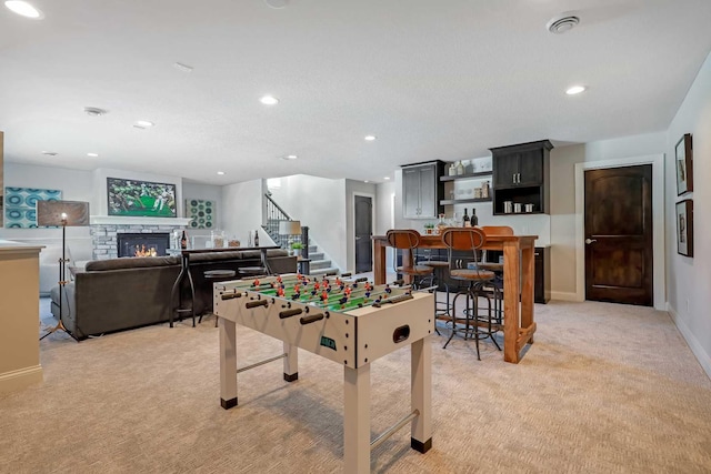 3175 Winfield Way SW, Prior Lake, MN 55372 - recreation room with a fireplace, indoor bar, recessed lighting, and light colored carpet