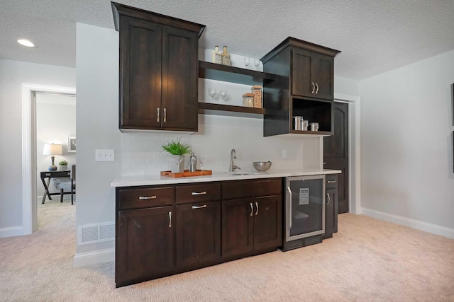 3175 Winfield Way SW, Prior Lake, MN 55372 - bar with light carpet, beverage cooler, a textured ceiling, tasteful backsplash, and visible vents