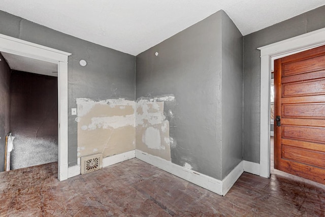 107 6th Ave SE, Waseca, MN 56093 - spare room featuring baseboards