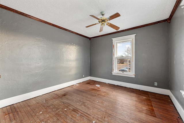 107 6th Ave SE, Waseca, MN 56093 - empty room with crown molding, a textured ceiling, ceiling fan, and hardwood / wood-style floors
