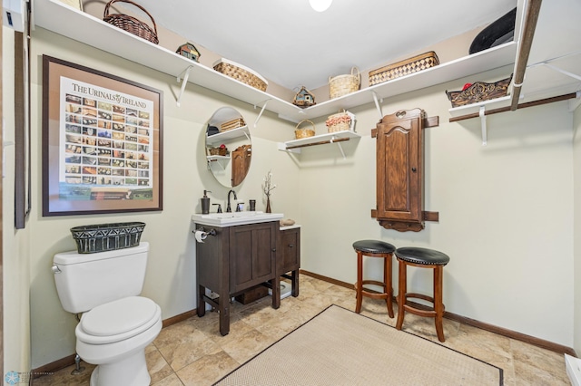 spacious closet featuring a sink
