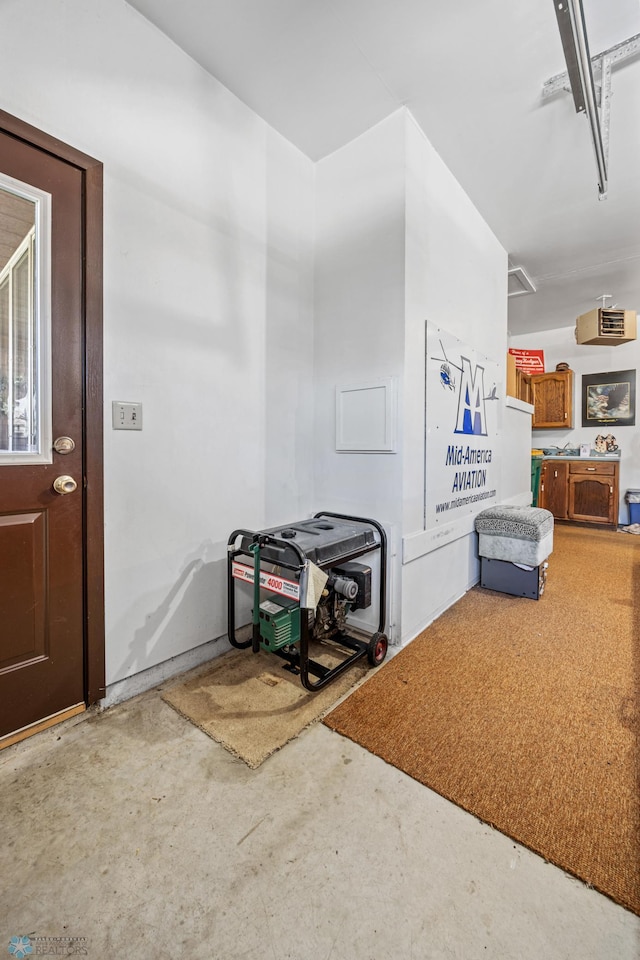 interior space featuring concrete flooring