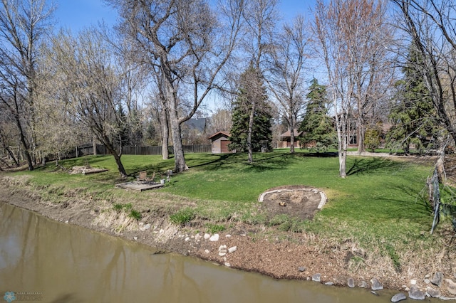 exterior space with a water view
