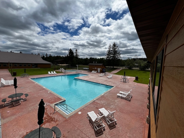 community pool featuring a patio