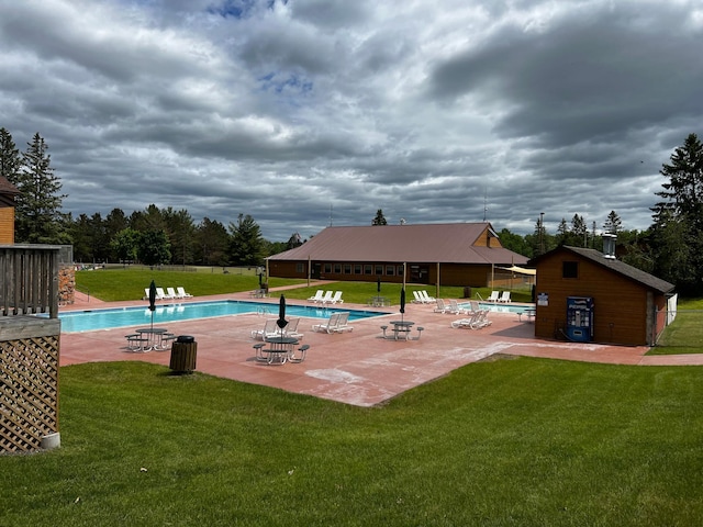 community pool with a patio area