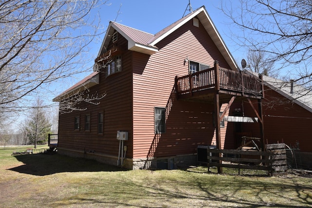 30472 Lightning Pass Unit 1, Turtle Creek Twp, MN 56443 - view of side of home with a deck and metal roof