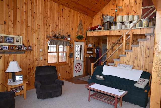30472 Lightning Pass Unit 1, Turtle Creek Twp, MN 56443 - carpeted living room with stairs, high vaulted ceiling, wood walls, and wood ceiling
