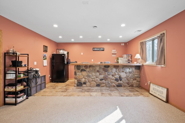 reception area featuring bar area and visible vents