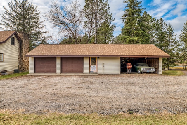 9700 Aspen Ave NW, Bemidji, MN 56601 - garage with central air condition unit and a garage
