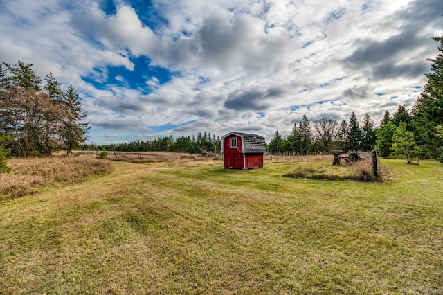 9700 Aspen Ave NW, Bemidji, MN 56601 - view of yard with a shed, an outbuilding, and a rural view