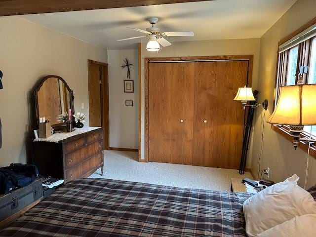 9700 Aspen Ave NW, Bemidji, MN 56601 - bedroom featuring multiple windows, carpet, a closet, and ceiling fan