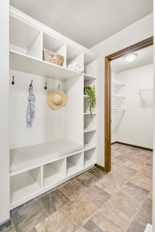 mudroom featuring baseboards
