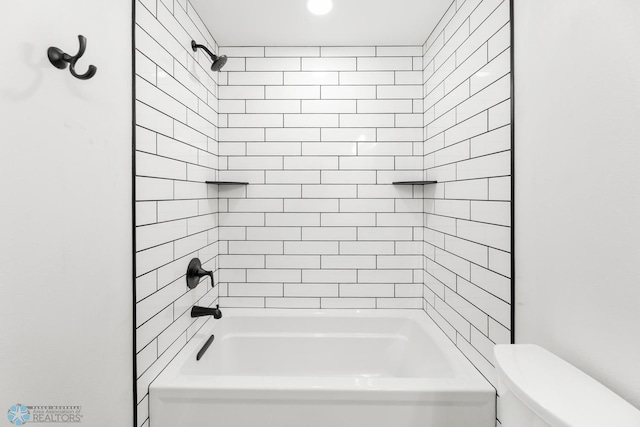 bathroom featuring toilet and tub / shower combination