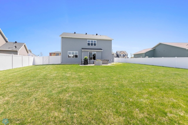 rear view of property with a patio area