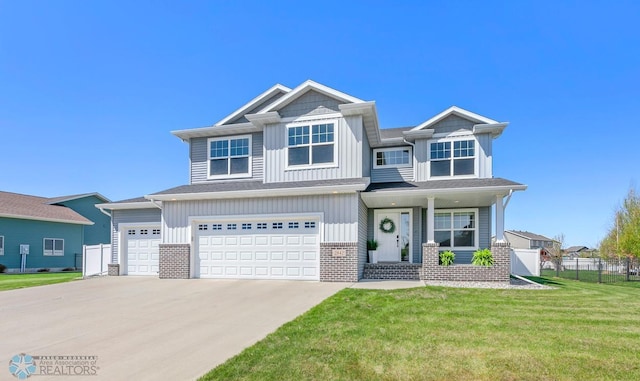 view of front facade featuring board and batten siding, concrete driveway, an attached garage, brick siding, and covered porch