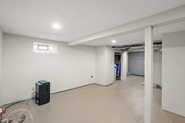 below grade area featuring recessed lighting