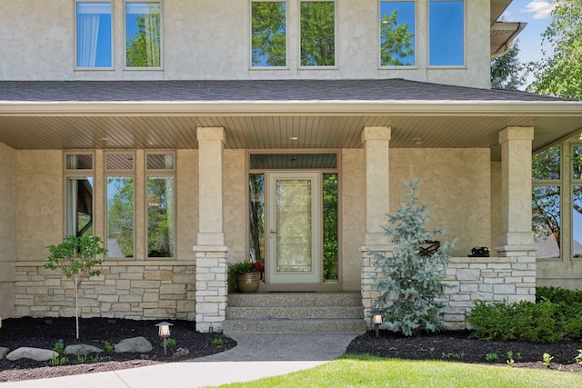 4970 Yuma Ct N, Plymouth, MN 55446 - property entrance with stone siding, stucco siding, and covered porch
