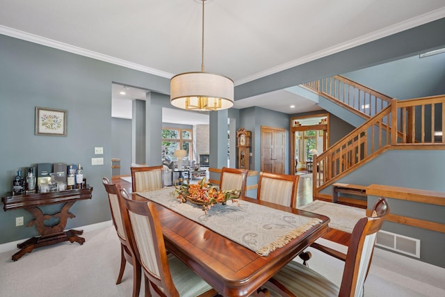 4970 Yuma Ct N, Plymouth, MN 55446 - dining area featuring crown molding, carpet, baseboards, and stairway
