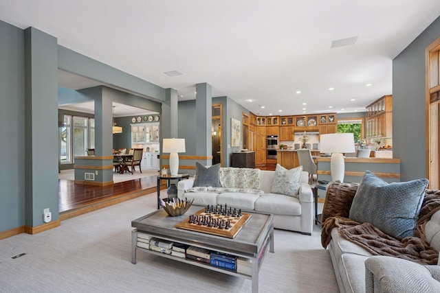 4970 Yuma Ct N, Plymouth, MN 55446 - living area featuring light colored carpet, recessed lighting, and baseboards
