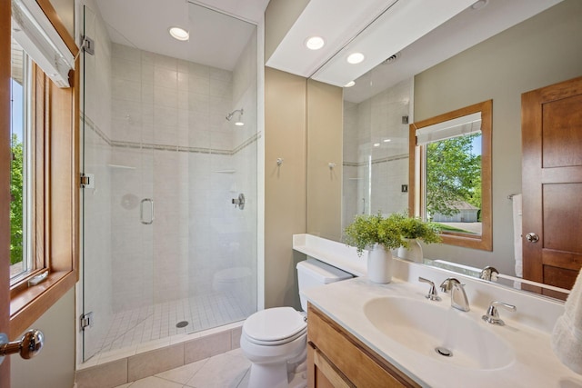 4970 Yuma Ct N, Plymouth, MN 55446 - full bath featuring toilet, vanity, a shower stall, tile patterned flooring, and recessed lighting