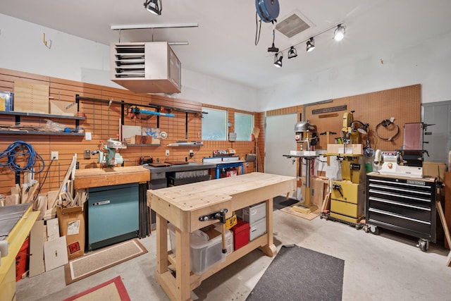 4970 Yuma Ct N, Plymouth, MN 55446 - garage featuring a workshop area and a heating unit
