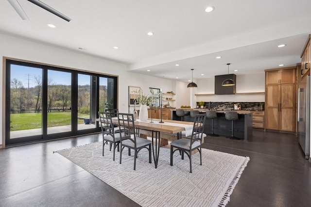 dining room featuring recessed lighting
